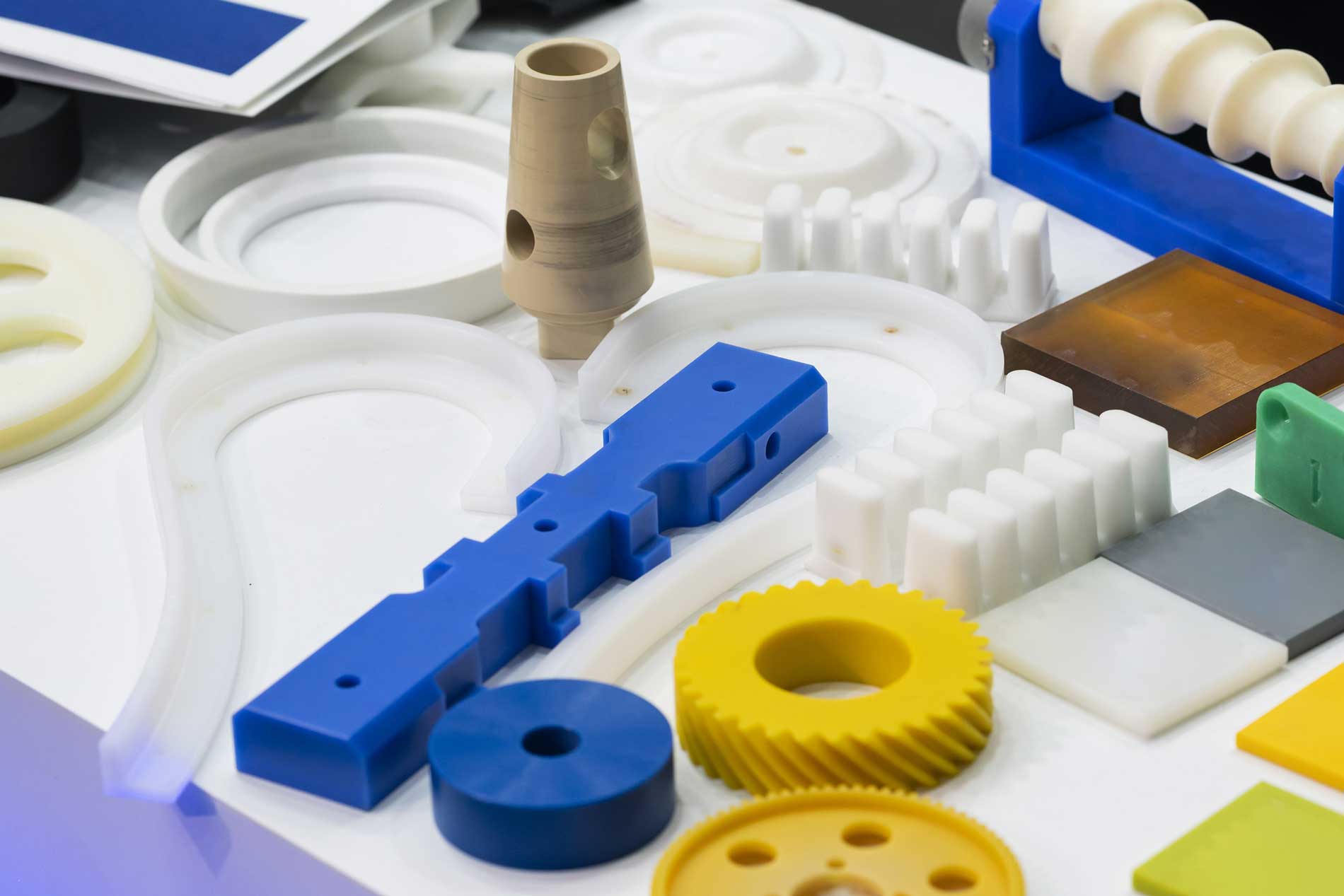 Yellow, blue and white plastic pieces